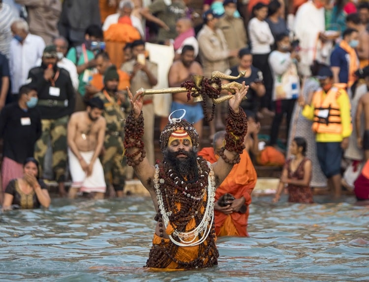 Take bath in holy water a best things to do in Rishikesh in Summer time.